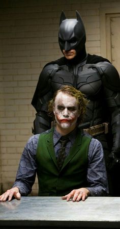 two men dressed up as batman and the joker