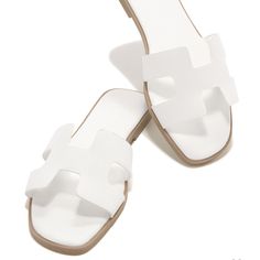 Brand New, Tried On Once. Size 5.5 Fit More Like A Size 6 Length Wise. White Flat Heel Sandals For Beach, Trendy White Slide Flip Flops, White Round Toe Sandals For Day Out, White Open Toe Sandals For Day Out, Chic White Flip Flops For Vacation, White Flat Heel Slides For Spring, Trendy White Sandals For Vacation, White Cushioned Flip Flops For Spring, Chic White Slides For Summer