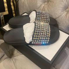 Brand New Gucci Crystal Embellished Slide Sandals In Box / Dust Bag Never Worn. Beautiful And Elegant And Will Brighten Up Any Outfit. Beautiful On The Foot And Will Turn Heads When You Step Out Designer Black Sandals With Rhinestones, Designer Black Embellished Sandals, Designer Embellished Flat Sandals, Designer Round Toe Sandals With Rhinestones, Designer Sandals With Rhinestones And Round Toe, Designer Rhinestone Sandals With Round Toe, Luxury Flat Sandals For Party, Black Gucci Slides, Gucci Bloom Slides