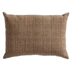 a brown pillow on a white background