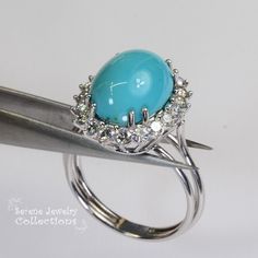 Beautiful Persian Turquoise diamond ring, it has not been stabilized. Brilliant round diamonds encircle the turquoise. Ring Size: 11 Total Weight: 11.92 grams Precious Metal: Platinum Precious stones: -Sleeping Beauty Turquoise Center Stone: 16.4mm x 12.7mm -White Round Diamonds: 1.6 carats Turquoise Diamond Ring With Center Stone, Fine Jewelry Turquoise Ring With Center Stone, Luxury Turquoise Diamond Ring As Gift, Turquoise Diamond Rings With Gemstones, Turquoise Diamond Rings With Center Stone, Formal Oval Cabochon Turquoise Ring, Fine Jewelry Turquoise Diamond Ring, Fine Jewelry Diamond Turquoise Ring For Anniversary, Luxury Turquoise Diamond Ring