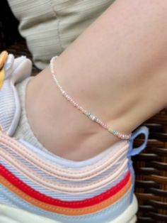 These dainty beaded anklets are made with pastel seed beads and freshwater pearl. They make the perfect summer and beach accessory. They each come with extenders that allow for extra length.  Sizes:  Small/Medium: 9" (up to 10" with extender) Large/XL: 10" (up to 12" with extender) Hand crafted with love and care.  Check out my other Anklets here: https://shopcrystalelements.etsy.com?section_id=49075686 Thank you for your support! Don't forget to explore all that my shop has to offer - all orders over $35 get free shipping! Please message me with any questions! Please note: Take care not to submerge in water to prolong the lifespan of the jewelry and help prevent tarnishing. Diy Jewelry Set, Anklet Silver, Anklet For Women, Pastel Beads, Rainbow Pearl, Pearl Anklet, Beaded Anklet, Silver Anklet, Anklets Boho