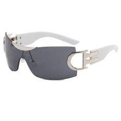 Elevate your style game with our Oversized Rimless Double D Armed Y2K Wholesale Sunglasses. These statement-making shades will make you stand out from the crowd, while providing maximum UV protection for your eyes. Guaranteed to bring compliments and protect your vision - the perfect combination! White Rimless Sunglasses For Summer, Rimless Plastic Shield Sunglasses With Gradient Lenses, Modern White Rimless Sunglasses, Trendy White Rimless Sunglasses, Plastic Shield Sunglasses With Tinted Lenses For Streetwear, Rimless Shield Sunglasses With Tinted Lenses, Streetwear Plastic Shield Sunglasses With Tinted Lenses, Rimless Plastic Shield Sunglasses With Tinted Lenses, Streetwear Shield Sunglasses With Tinted Lenses