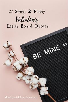 a black board with the words be mine and cotton on it next to a pink background