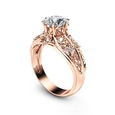 14K Rose Gold Engagement Ring Unique Engagement Ring Rose Gold Moissanite Ring Vintage Engagement Ring. Rose Gold Ring, Rose Gold Engagement, Engagement Ring, Unique Engagement, Diamond Ring, Unique Diamond Ring, Diamond Engagement, Unique Ring, Ayala Jewelry,Vintage Ring, Vintage Engagement, Unique Vintage Ring, Rose Gold Vintage. There is nothing like a gorgeous 14K rose gold engagement ring to set her heart aflutter. Meticulously handcrafted and forged in designer detail, it is a unique diamo Classic Rose Gold Rings With Intricate Design, Rose Gold Diamond Ring With Intricate Design, Intricate Rose Gold Round Diamond Ring, Rose Gold Fine Jewelry With Intricate Design For Wedding, Intricate Rose Gold Diamond Ring, Rose Gold Rings With Intricate Design, Rose Gold Diamond Ring With Intricate Design As Gift, Luxury Rose Gold Wedding Ring With Intricate Design, Classic Rose Gold Filigree Ring With Intricate Design