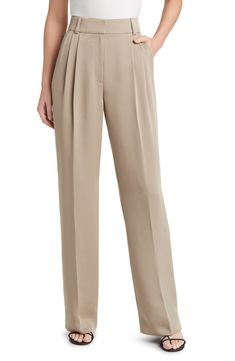 Chic for the office or a night out, these wide-leg trousers are fashioned from smooth woven fabric and pleated at the superhigh waist to further the flowy fit. 32" inseam; 20" leg opening; 13 1/2" front rise; 16" back rise (size 8) Zip fly with hook-and-bar closure Front slant pockets; back welt pockets 100% polyester Machine wash, tumble dry Imported Elegant Wide Leg Bottoms For Semi-formal Occasions, Wide Leg Pants With Pleated Waist, Business Casual Wide-leg Pleated Pants, Loosely Fitted Trousers With Pleated Waist, Trousers With Pleated Waist And Loosely Fitted Hips, Tailored Wide Leg Pleated Dress Pants, Chic Wide-leg Pants With Pleated Waist, Tailored Pleated Wide Leg Dress Pants, Elegant Wide Leg Pants For Office