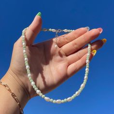 "The Avocado necklace is beautifully designed with real emerald stones and freshwater pearls! It is delicately handmade as a choker style. It includes a gold-filled spring ring lock and a gold-filled one inch extension that makes it adjustable from 15\" - 16\". Complete your summer look with this, or gift this to a loved one! Only 2 are made!" Avocado Necklace, Choker Style, Emerald Stone, One Inch, Summer Look, Spring Rings, Summer Looks, Freshwater Pearls, Necklace Etsy