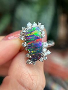 Item Information Weight (ring)           8.56g Weight (opal)           3.40cts Size (opal)                15.1×7.3×3.5mm Weight (diamonds )      0.595cts The size of the ring can be risized Attention：This is a collectible level Opal jewelry, It's second-hand jewelry auctioned from Japan There are no quality issues or cracks, Accompanied by the certificate* More Affordable price，Only make a reasonable profit，So I can offer a high quality item and affordable price for every customers， Better servi Luxury Opal Ring With Diamond And Gemstone Accents, Luxury Diamond Opal Ring With Gemstone Accents, Formal Multi-stone Opal Ring With Diamonds, Formal Multi-stone Diamond Opal Ring, Luxury Multi-stone Opal Ring For Anniversary, Luxury Opal Ring With Gemstone Accents For Anniversary, Luxury Multi-stone Opal Anniversary Ring, Exquisite Multi-stone Opal Ring For Formal Occasions, Elegant Multicolor Opal Ring