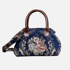 Embrace timeless elegance with our exquisite Victorian Carpet Satchel, a masterpiece meticulously crafted from thick chenille carpet for a luxurious and sophisticated touch. Designed with unique construction, this handbag stands on its own, effortlessly blending style with functionality. Crafted for enduring quality, the bag features genuine leather handles and a sturdy, heavy cotton canvas lining. Each purchase includes a detachable and adjustable shoulder strap, generously measuring 55 inches in length. The strap is skillfully crafted from the same chenille as the bag, and adorned with high-quality bronze hardware for added charm. Perfectly sized for everyday use, our handbag offers ample space to carry your essentials with ease. Stay organized with one zippered pocket, precisely sized a Victorian Carpet, Traditional Carpet, Carpet Bag, Blue Carpet, Bronze Hardware, Mary Poppins, Coin Purses, Purse Pouch, Everyday Carry