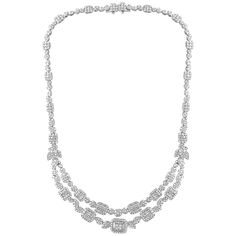 18.5 Carats VS, E Diamond Necklace made in 18 Karat white gold . One of our premium necklace from our Bridal collection. 18.5 carats of VS quality of Diamonds all mounted in 18 karat gold. Weight of the gold is 48 grams. Matching earrings are available . There are two layers in the necklace . Please take a look at my other pieces of jewelry and watches on 1st dibs FOLLOW MonalisaJewelry Inc. storefront to view the latest collection. Free Shipping with in United States We encourage you to take a Luxury Engraved White Gold Diamond Necklace, Luxury Platinum Diamond Necklace With 17 Jewels, Luxury Silver Baguette-cut Diamond Necklace, Luxury Silver Baguette Cut Diamond Necklace, Luxury Platinum Necklaces With Diamond Accents, Exquisite Platinum Necklace With Single Cut Diamonds, White Gold Baguette Cut Necklace For Evening, Platinum Bridal Necklace With 17 Jewels, White Gold Baguette Cut Necklaces For Evening