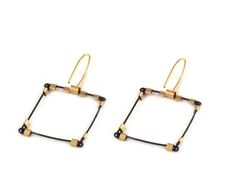 Need a subtle touch of cubism to your look? Look no further than the Mini Square Line Hooks, the lightweight geometric earring for angular and fun accent piece. Flexible, light woven stainless steel mini cable finished with nylon for a smooth feel. Each piece is hand finished with little accents of sterling silver and/or 14k gold-fill as well as a choice of semi-precious stones. LENGTH: 1.5" HOOKS: 14k gold filled or sterling silver FEATURES: Hypoallergenic materials Travel-Friendly with metal m Cubism, Geometric Earrings, Hook Earrings, Accent Pieces, Gold Hardware, Semiprecious Stones, Precious Stones, Semi Precious, Gold Filled