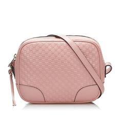 This Pre-Owned Gucci GG Leather Bree Crossbody Bag is perfect for those who want to add a touch of luxury to their outfit. The bag features a beautiful brown GG leather fabrication, which gives it a classic and timeless look. Bag Silhouette: Crossbody Bags Color: Pink Fabrication: GG Leather Closure Type: Zip The adjustable flat leather shoulder strap ensures that the bag can be worn comfortably over the shoulder or across the body. The top zip closure provides secure storage for your belongings