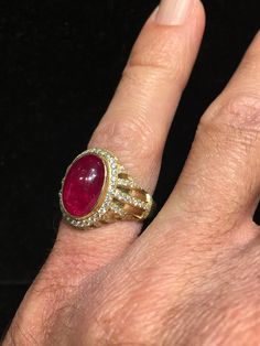 "WOW! Perfection! Precision! Extraordinary natural Ruby (No heat. Certified. From Africa. 8.49ct), diamond & 18K gold ring, by Robert Railey, long time Santa Fe custom jewlery artist. Exquisite design (CAD) & execution of the lines! Chock full of diamonds! Size 7.5 Face: 11/16\" tall x 7/8\" wide Ruby: .5\" tall x 5/16\" wide dome With 18K (gold) stamp (see 8th photo) Beautiful squared off bottom of the gold shank/band design \"About R. Railey: Background My experience of what it is that Dome Diamond Ring, Band Design, Photo Beautiful, 18k Gold Ring, Ruby Diamond, Gem Stone, Natural Ruby, Exquisite Design, Sterling Ring