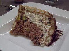 a piece of cake sitting on top of a white plate