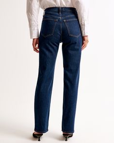 Elevate your wardrobe with the timeless sophistication of Abercrombie & Fitch's Women's High Rise Vintage Straight Jean. Designed to flatter, these jeans feature a statuesque 10.5” high rise and a relaxed fit through the waist and hips, culminating in a chic straight-leg silhouette. The super dark wash and clean hem lend a sleek, versatile finish, making these jeans a perfect staple for any fashion-forward ensemble.

- Size: 32 LONG
- Color: Super Dark
- Material: Pocket Bag - Polyester, Cotton Vintage Straight Jeans, Female Features, Super Dark, Dark Material, Women's Bottoms, Pocket Bag, New Classic, Classic Vintage, 90s Fashion