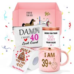 a pink gift box with two mugs, one for dad and the other for daughter