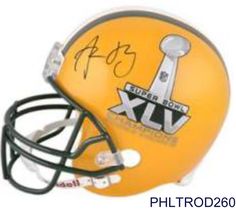 an autographed football helmet signed by the super bowl champs