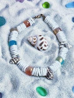 🐚Discover the perfect blend of stylish beauty beach vibes with Beach Vibes handmade Shell Jewelry, the ultimate Beach Accessory for any Beach Bachelorette or Hawaiian Jewelry lover. Whether you're gearing up for a Beach Club Party or seeking the ideal Bride Gifts, our collection, featuring Colorful Glass Beads, is designed to impress. Each piece is carefully crafted with love and inspired by the serene beauty of Ocean Isle Beach. Ideal as a Bride Accessory, this jewelry also makes a thoughtful Handmade Multicolor Beach Swimwear, Handmade Multicolor Swimwear For Beach, Handmade Multicolor Swimwear For Vacation, Handmade Beachy Swimwear For Beach Season, Handmade White Swimwear For Poolside, Handmade White Summer Swimwear, Handmade White Swimwear For Summer, White Handmade Summer Swimwear, Handmade Bohemian Swimwear For Beach