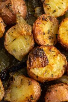 roasted potatoes with herbs and seasoning in a pan