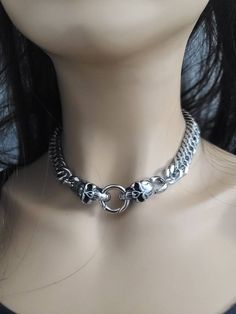 This is a Viking style chunky necklace, handcrafted with care using only the finest stainless steel materials. This piece features skull clasps that add a touch of gothic edge. The chunky style of this piece makes it a statement accessory, perfect for adding a bold touch to any outfit. Whether you're looking to treat yourself or surprise a loved one, this Norse goth necklace makes for an unforgettable gift. Its goth punk heavy metal hip hop jewelry style is sure to make a statement. Invest in a timeless piece of jewelry that seamlessly blends classic Viking style with contemporary gothic design.  25c43pr-20p200h Punk Metal Choker With Clavicle Chain, Punk Metal Choker For Alternative Fashion, Edgy Halloween Streetwear Necklaces, Edgy Halloween Streetwear Necklace, Edgy Streetwear Choker Necklace, Gothic Metal Clavicle Chain Choker, Gothic Stainless Steel Chain Necklace, Gothic Silver Clavicle Chain Necklace, Silver Necklace For Halloween Streetwear