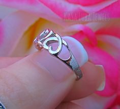 Hearts Love Sterling silver ring sizes 4-11 SOLID sterling stamped 925 silver Tarnish free 4 5 6 7 8 9 10 11 *IF YOUR SIZE ISNT SHOWING, MESSAGE ME. I might be sold out and will be able to replenish shortly* Top of ring height: 6.2mm Band width: 3mm Shank width: 2.4mm This is a High Polished solid sterling silver ring with Rhodium plating to prevent tarnishing. Nothing but the best from my custom jewelry store. --------------------------- Please follow care instructions. Any rings with stones, r Adjustable Heart Ring For Promise On Mother's Day, Adjustable Heart Ring For Promise And Mother's Day, Dainty White Gold Heart Ring For Promise, Silver Sterling Heart Ring For Mother's Day, Sterling Silver Hypoallergenic Heart Ring For Anniversary, Sterling Silver Open Heart Promise Ring, Adjustable Silver Heart Ring For Mother's Day, Hypoallergenic Silver Heart-shaped Ring, Sterling Silver Nickel-free Heart Promise Ring