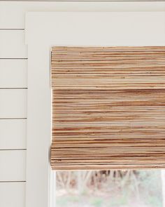 a window with blinds made out of bamboo