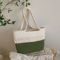 Casual style woven tote bag with large capacity. Size/Inches SIZE HEIGHT(CM) 21 THICKNESS(CM) 11 LENGTH(CM) 40 Trendy Rectangular Canvas Bag With Braided Handles, Chic Green Canvas Bag For Daily Use, Casual Canvas Bag With Braided Double Handles, Casual Green Square Canvas Bag, Green Square Bucket Bag With Large Capacity, Casual Square Hobo Bag With Braided Handles, Trendy Large Capacity Basket Shoulder Bag, Trendy Natural Canvas Bag In Rectangular Shape, Casual Canvas Bag With Braided Handles For Shopping