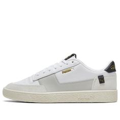 The Puma Ralph Sampson MC 'White Grey' is a classic hoops shoe with a modern twist. The leather upper is clean and minimalist, with black, white and grey tones that are easy to style. The addition of gold foil branding adds a touch of luxury, while the Shock Wedge midsole provides cushioning and comfort. The rubber outsole ensures traction and durability, making this shoe perfect for the court or the street. (SNKR/Retro/Skate/Casual/Unisex/Low Top) Puma Ralph Sampson, Ralph Sampson, Grey Tones, The Court, Stylish Sneakers, Gold Foil, Low Top, Grey And White, Foil