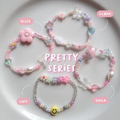 four bracelets on a white plate with the words pretty series written below each bead