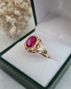 Vintage ring in 18-carat yellow gold set with a synthetic ruby of approximately 1.90 carats. Hallmarks present. Dimensions of the Ruby: 8.55 x 6.50 mm Weight: 4.55 g Size 55.5 - US size 7.25 (Resizing possible, not made by the store) Delivered with certificate invoice. Sending in a tracked and secure package. Do not hesitate to contact me if necessary! Shop link: https://www.etsy.com/fr/shop/EtoileGrenat?ref=seller-platform-mcnav Formal Ruby Signet Ring In Fine Jewelry Style, Fine Jewelry Ruby Signet Ring For Formal Occasions, Ruby Signet Ring For Formal Occasions, Ruby Signet Ring Fine Jewelry For Formal Events, Gold Ruby Signet Ring For Formal Occasions, Formal Oval Lab-created Ruby Ring, Yellow Gold Ruby Signet Ring Hallmarked, Yellow Gold Ruby Signet Ring For Anniversary, Formal Ruby Ring With Diamond Cut In Yellow Gold