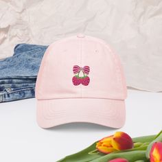 Coquette Strawberry Embroidered Pastel Baseball Hat, Cute Aesthetic Bow Hat, Strawberry Lover Summer Cap, Gift For Girlfriend, Gift For Her The pastel baseball hat's made of 100% chino cotton. It has an unstructured crown, 6 panels, and a low-profile design. But more importantly, this unique hat will complement your one-of-a-kind outfits! * 100% chino cotton * Soft, unstructured crown * 6-panel, low-profile * Pre-curved peak * Stitched eyelets * Self-fabric strap with a tri-glide buckle * Sponge Summer Cotton Hats For Gifts, Summer Cotton Hats As Gifts, Summer Cotton Hats Perfect For Gifts, Cotton Summer Hats For Gift, Cotton Summer Hats As Gifts, Cute Cotton Baseball Cap For Spring, Cute Spring Cotton Baseball Cap, Cute Hats With Embroidered Logo And Curved Brim, Pink Cotton Hat Gift