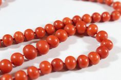 -Antique Sterling Silver Marcasite Natural Red Orange Coral Beaded Necklace -Total length: 23.25 in -Bead size:about 8.6 mm x 7 mm -Coral on clasp size: 8.15 mm -Total weight: 50.8 g -Marked 835 -The beads are a little bit graduated Classic Red Coral Formal Jewelry, Red Round Beads For Formal Occasions, Formal Red Round Beads, Classic Round Beads For Formal Occasions, Classic Formal Beads, Coral Beads Necklace, Sterling Silver Marcasite, Orange Coral, Coral Earrings