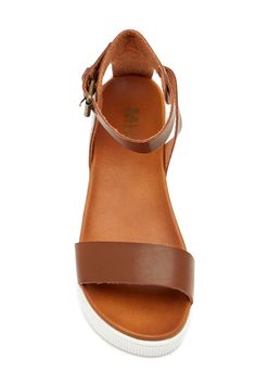 Two-strap styling and a textured platform sole add ample sporty style to this street-chic sandal.Sizing: True to size. M=standard width. Spring Brown Sport Sandals With Buckle Closure, Synthetic Ankle Strap Sport Sandals, Synthetic Ankle Strap Sport Sandals With Buckle, Synthetic Sport Sandals With Ankle Strap And Buckle Closure, Spring Brown Sport Sandals With Adjustable Strap, Brown Sport Sandals With Adjustable Strap For Spring, Adjustable Ankle Strap Platform Sport Sandals, Adjustable Platform Sport Sandals With Ankle Strap, Trendy Leather Sport Sandals With Ankle Strap