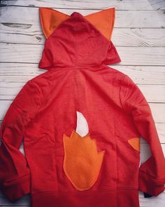 This fox hoodie has been a huge hit. Perfect for any fox lover . I recently took our fox pocket hoodie and this hoodie and combined them. You can choose if you want a fix in the pocket or not. Orange hoodie may vary in different shades. Each computer / screen / phone might show colors differently. Orange hoodies are a tough find so that is why sometimes I have to use different brands and they have a slight color difference. Wash inside out and lay or hang to dry. If dried in the dryer they loose Cute Long Sleeve Hoodie With Kangaroo Pocket, Cute Hoodie With Kangaroo Pocket, Cute Winter Hoodie With Kangaroo Pocket, Cute Fall Sweatshirt With Kangaroo Pocket, Cute Cotton Hoodie With Kangaroo Pocket, Cute Hoodie Sweatshirt With Kangaroo Pocket, Cute Winter Hoodie With Pockets, Cute Hoodie With Pockets For Winter, Cute Hooded Hoodie For Fall