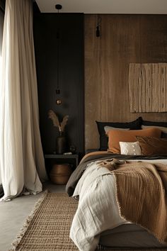 a bedroom with a bed, rugs and curtains in dark colors on the walls