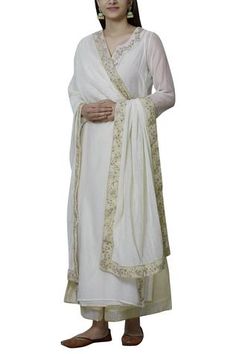 White striped dupatta with placement leaf motif work.
Components:1
Embroidered
Fabric:Cotton Silk
Color:White
Pintuck striped detail
Note: Kurta and pant worn by the model is not for sale - Aza Fashions Kashmiri Bride, Designer Dress For Men, White Silk Dress, Velvet Lehenga, Raw Silk Lehenga, Indian Designer Suits, Silk Dresses, Lehenga Skirt, Beautiful Suit