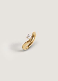 Sleek and modern, the Katherine ring features a round diamond set atop a 14k solid gold curved band. 14k solid gold—always Hollow Band width: 6.5mm (front), 2.5mm (back) Lab Created Diamond Carat weight: 0.26 ctw Diamond Cut: Round Full Diamond Clarity:VS Diamond Color: F/G/H Cut, Polish, Symmetry: Excellent Made to order: 4-6 weeks Luxury Classic Engraved Open Band Ring, 0 5 Carat Engagement Ring, Modern Diamond Ring, Small Diamond Ring, Floating Diamond Ring, Modern Diamond Rings, Gold Ring With Diamond, Small Diamond Rings, Curved Ring