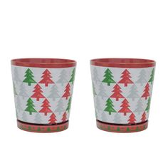 two red and green cups with trees on them