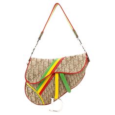 Dior by John Galliano rare rasta saddle bag. Condition: Excellent. Packing/accessories: Box and dustbag. Measurements: 24cm x 20cm x 5cm Dior Rasta, Galliano Dior, Dior By John Galliano, Expensive Fashion, Saddle Handbags, Structured Shoulder, Pretty Bags, John Galliano, Crochet Handbags