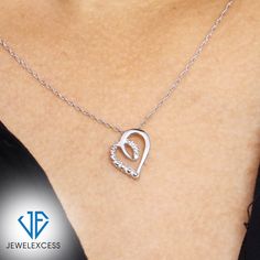 A Gift That Sparkles & Dazzles All: This timeless diamond heart pendant is sure to capture anyone’s heart. Fashionably accented with brilliant white diamonds, this heart necklace is romantic, dreamy and expertly crafted to reflect your love. Gorgeous 18 Inch Rope Chain Included: This Sterling Silver or 14K Gold-Plated silver diamond heart necklace is beautifully suspended from a fashionable 18-inch rope chain, which is as durable as it is stylish. The chain can also be used with other pendants o Fine Jewelry Diamond White For Anniversary, Fine Jewelry In Diamond White For Anniversary, Diamond White Fine Jewelry For Anniversary, Diamond White Sterling Silver Heart Necklace, White Gold Jewelry With Diamond Cut For Anniversary, White Gold Diamond Cut Jewelry For Anniversary, Sterling Silver Heart Pendant Jewelry With Prong Setting, Sterling Silver Heart Pendant With Prong Setting, White Gold Heart Pendant Jewelry With Prong Setting