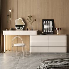 a white dresser sitting next to a mirror on top of a wooden wall in a room