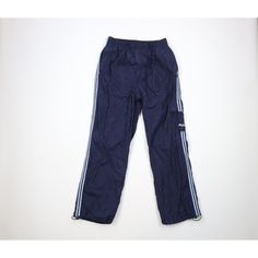 Vtg 90s Fila Mens Large Spell Out Striped Lined Wide Leg Adjustable Cuff Pants Mens Pants Blemish back right Mens size Large Measurements are: 15 inches across the waist laid flat 30 inch inseam 41.5 inches from top to bottom 8.5 inch leg open Blue Polyester US Shipping is FREE, Canada is $15 and International is $24 Check out my other items in my store! PR2121 90s Style Streetwear Trousers, 90s Streetwear Trousers, 90s Style Trousers For Streetwear, 90s Style Cargo Pants For Streetwear, 90s Style Full-length Streetwear Pants, 90s Full Length Streetwear Pants, 90s Parachute Pants For Streetwear, Vintage Trousers For Streetwear, 90s Style Cotton Parachute Pants