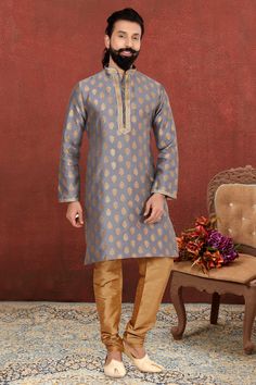 Introducing the Reach Color Gorgeous Fancy Fabric Reception Wear Readymade Kurta Pyjama for Men. Crafted from high-quality fabric, this traditional yet contemporary outfit offers both elegance and ease. Ready to wear and perfectly stitched, it saves time while ensuring you look impeccable. Ideal for receptions, weddings, and other grand occasions, this kurta pyjama set is a must-have in every man's wardrobe. Available in vibrant colors, it effortlessly combines classic charm with modern appeal. Traditional Jacquard Sets For Formal Occasions, Elegant Long Sleeve Kurta With Zari Weaving, Traditional Jacquard Sets For Festive Occasions, Festive Long Sleeve Jacquard Sets, Traditional Jacquard Kurta For Wedding, Traditional Churidar With Zari Weaving And Long Sleeve, Long Sleeve Traditional Wear With Zari Weaving For Eid, Brocade Kurta For Eid And Traditional Ceremonies, Brocade Kurta For Diwali And Traditional Ceremonies