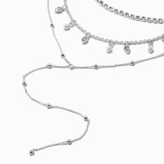 Claire's Silver-tone Crystal & Faux Pearl Multi-Strand Y-Neck Necklace Silver Adjustable Backdrop Necklace With Clavicle Chain, Silver Layered Metal Charm Necklaces, Silver Adjustable Rhinestone Dangle Necklace, Layered Silver Metal Charm Necklaces, Silver Multi-strand Charm Necklace For Layering, Silver Dangle Necklace With Double Chain, Silver Layered Charm Necklaces In Metal, Layered Silver Double Strand Necklaces, Silver Layered Double Strand Necklaces