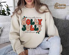 Holly Jolly Christmas Sweatshirt,Funny Christmas Sweater,Christmas Women Crewneck,Holiday Apparel,Retro Christmas Clothing,Xmas Sweatshirt ✨ Thank you for shopping! BEST WAY TO ORDER 1. Select the size(Please make sure to check our size chart) 2. Select the color 3.Add a note to seller when checking out with any special requests PRODUCT DETAILS: Poly-Cotton Blend Warm and cozy Fits true to size For an oversized look, we recommend ordering up a size or two depending on how big you like it! Sweatshirts are sourced from various brands, such as Gildan, Jerzees, Rustic United and Hanes. Note that a specific brand cannot be guaranteed. PRINTING STYLE We use DTF printing. This is the best technology at the moment.  CARE INSTRUCTIONS Please wash the item inside out in cold or warm water with delic Have A Holly Jolly Christmas, Christmas Clothing, Holly Jolly Christmas, Xmas Tees, Holiday Apparel, Funny Christmas Sweaters, Funny Christmas Gifts, Xmas Shirts, Jolly Christmas