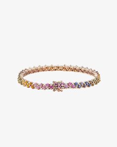 Introducing our Princess Mini Stack Tennis Bracelet, a fusion of elegance and everyday versatility. This bracelet, set with 4.80 carats of 2x2mm princess-cut pastel sapphires and 0.95 carats of baguette white diamonds, is a statement of style. Details 18k rose gold 4.80 carats of 2x2mm princess-cut pastel sapphires 0.95 carats of white diamond baguettes Bracelet measures 7" inches in length Box clasp with safety lock fastening 4.5mm width Ref: AKB435 Fine Jewelry Multi-stone Bracelet, Luxury Multi-stone Bracelet, Elegant Multi-stone Bracelet Jewelry, Elegant Multi-stone Bracelet, Elegant Multicolor Tennis Bracelet For Formal Occasions, Luxury Multicolor Jewelry With Sparkling Stones, Elegant Multicolor Cubic Zirconia Bracelets, Elegant Formal Multicolor Tennis Bracelet, Elegant Multicolor Bangle Tennis Bracelet