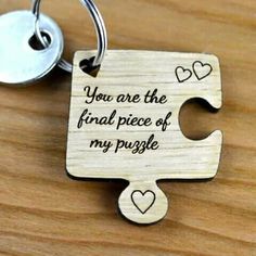 a wooden puzzle keychain that says, you are the final piece of my puzzle