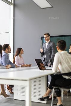 business people having a meeting in an office - stock photo - images