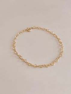 Handmade Heart of Gold Bracelet 🤍✨ 18 Karat Gold Filled Heart Chain Bracelet  Handmade to your exact wrist size, please indicate your wrist size in the notes section at checkout.  Choose from small (2.3mm) or large (3.2mm) size heart chain.  All 18 karat gold filled metal is hypoallergenic, nickel free, and lead free.  Handmade ethically in my home studio in Brookings, South Dakota.  Each piece is packaged in my Mandy Ellen Designs gift packaging with a polishing cloth included. Dainty Chain Jewelry For Valentine's Day, Dainty Valentine's Day Jewelry Chain, Dainty Chain Charm Bracelet, Adjustable Chain Heart Bracelet, Adjustable Heart Chain Bracelet, Dainty Heart Bracelet For Valentine's Day, Heart-shaped Adjustable Chain Bracelet, Dainty Everyday Chain Bracelet For Valentine's Day, Minimalist Heart-shaped Bracelet With Delicate Chain