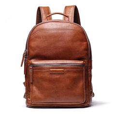 Presenting our most popular leather backpack – a robust yet luxurious accessory. Hand-crafted from vegetable-tanned leather, this backpack features a dedicated 15.6-inch laptop compartment. The refined look is versatile enough to exude sophistication in work, school, or outdoor settings. Enjoy the perfect blend of toughness and elegance with this highly sought-after leather backpack. Plenty of organizational pockets including 15.6 inches laptop compartment. Exterior: 1 front panel zipper pocket, 1 back panel hidden zipper pocket. Interior; 1 × 15.6 inches laptop sleeve, 2 small slot pockets, and 1 small zipper pocket. Dimensions + Materials- Dimensions: width: 12.6"(32cm); depth: 5.5"(14cm); height: 16.5"(42cm). Size: Medium Size. Vegetable tanned leather. Lining: polyester. Adjustable car Brown Travel Backpack With Smooth Grain, Classic Backpack With Smooth Grain For Everyday Use, Classic Leather Backpack With Smooth Grain For Everyday Use, Travel Backpack With Smooth Grain In Brown, Brown Smooth Grain Travel Backpack, Classic Leather Backpack With Smooth Grain For Travel, Classic Leather Backpack With Leather Lining, Brown Smooth Grain Standard Backpack, Classic Backpack With Leather Lining